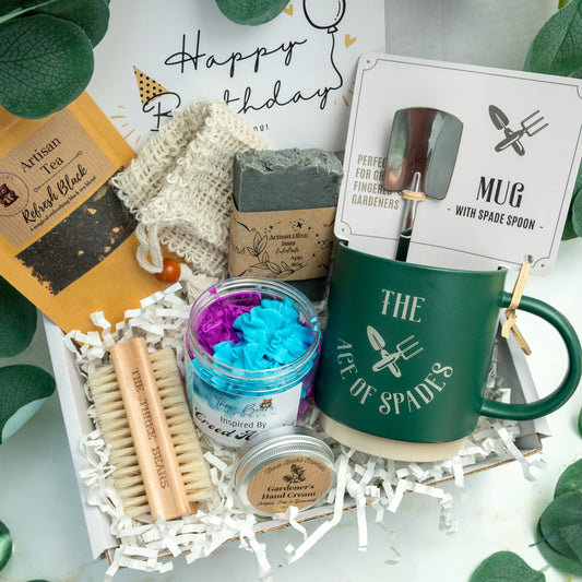Mens Gift set with a mug, whipped soap, hand cream, soap, nail brush, beverage and soap bag, all targeted towards gardeners