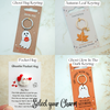 Collection of ghost-themed keyrings with packaging on a light background