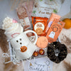 Boo basket with a ghost mug, foot masks, cookies, ghost keyring, hot chocolate and more. 