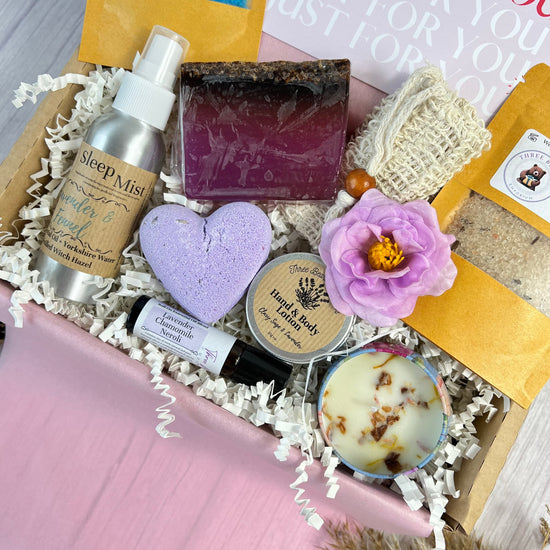 close up of the rest and relax pamper gift set filled with many lavender infused products
